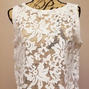 Shear embroidered sleeveless shell top